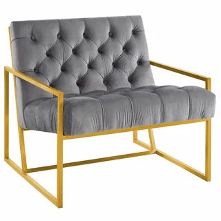 Luxury gray velvet armchair with tufted back and gold frame