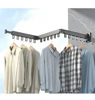 Wall-mounted double rod clothes rack with shirts hanging