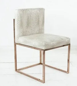 Modern beige velvet dining chair with gold metal frame