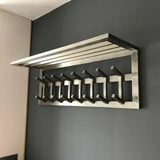 Modern metal wall-mounted coat rack with hooks and top shelf