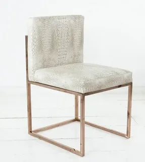 Modern beige velvet dining chair with gold metal frame