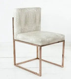 Modern beige velvet dining chair with gold metal frame